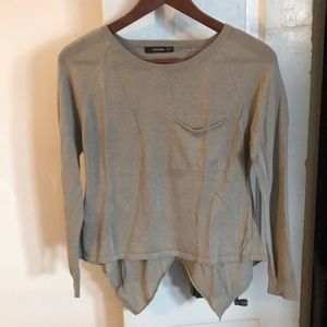 Chic beige cropped sweater with sheer back detail